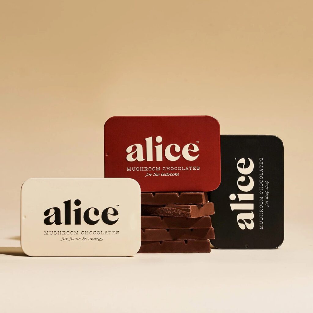 Alice mushroom chocolate bars with branded tins for energy, sleep, and bedroom wellness.