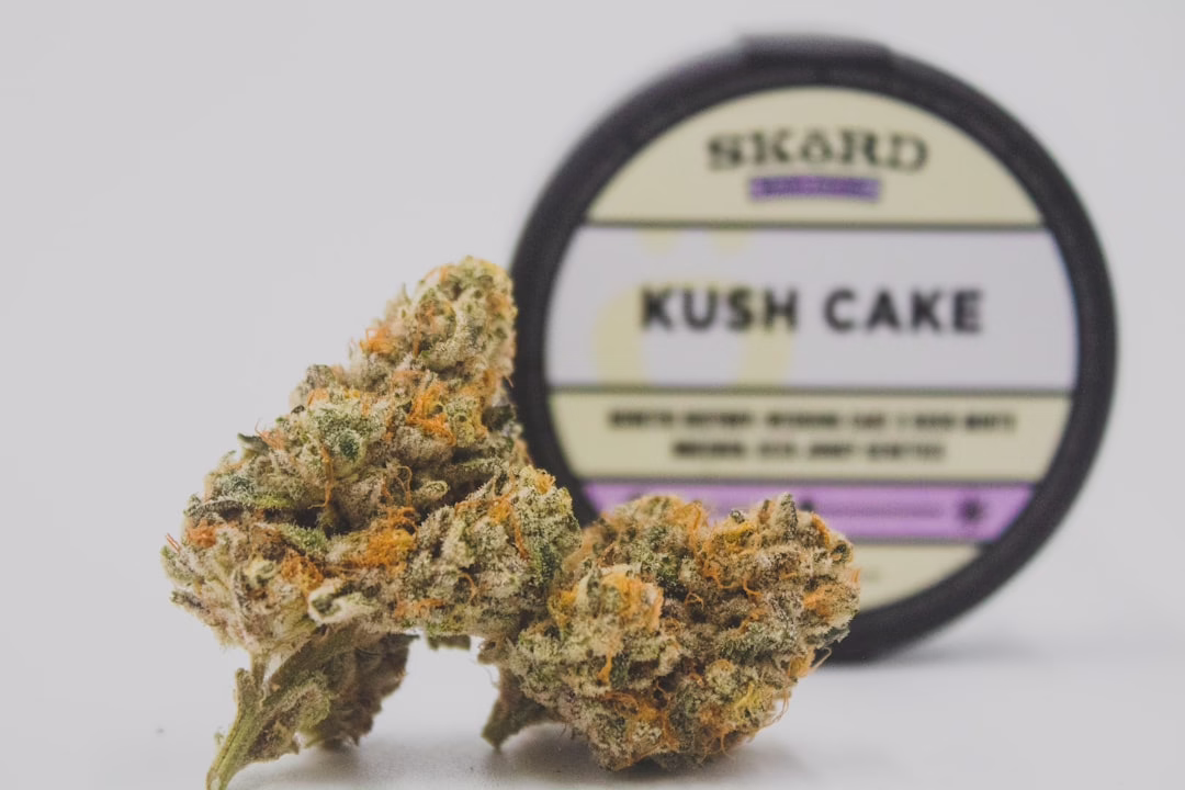 Kush Cake cannabis strain with labeled container